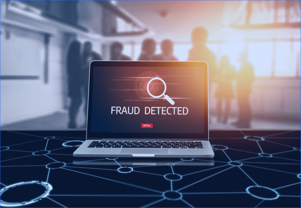 Advanced fraud detection system monitoring suspicious financial transactions on a laptop