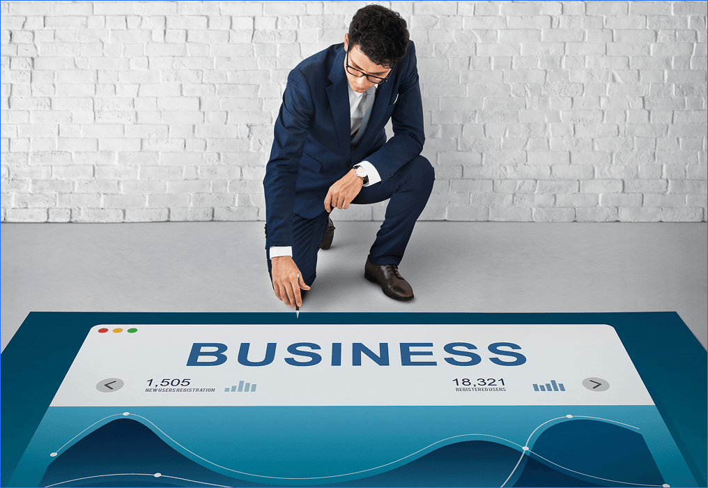 Business professional analyzing company performance dashboard to manage growing business complexity