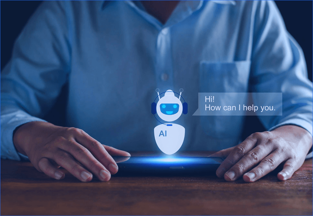Person using a tablet with an AI chatbot assistant on screen, representing automated customer interaction and support.